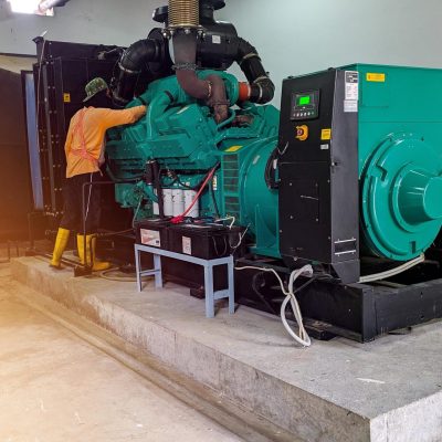 a-technician-is-doing-regular-maintenance-on-the-generator-engine-free-photo-scaled.jpeg
